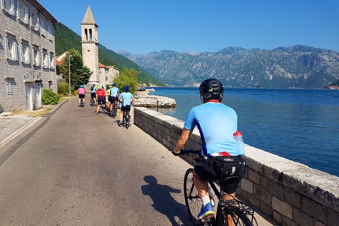 Bike tour - Kotor Bay circle and visit Our Lady of the Rock - Where you start: Sea Gate to Tre Sorelle Palace legends