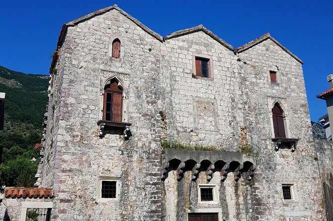 Bike tour - Kotor Bay circle and visit Our Lady of the Rock - The Church of Our Lady of Angels: the bay’s tight pinch