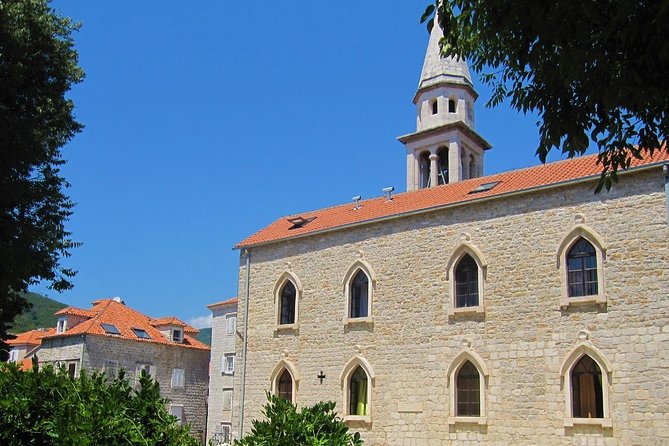 Budva City Tour - Strolling the sunny marina before you finish