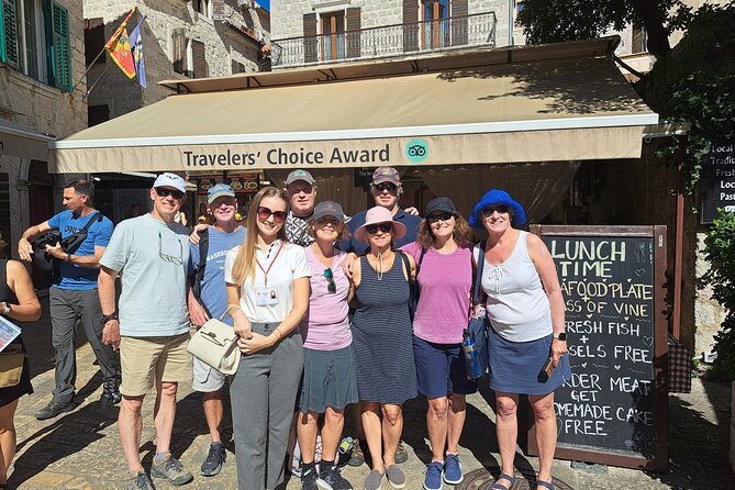 Kotor Old Town Walking Tour - Walking past palace names: Pima and Beskuća on paved streets
