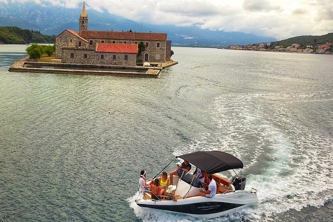 Lady of the Rocks and Perast Old Town - Our Lady of the Rocks: a man-made islet with a church, museum, and legend