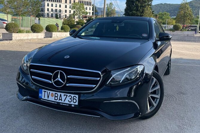 Private transfer from Tivat to Dubrovnik airport - Route snapshot: Tivat Bay scenery, ferry passage, and border control