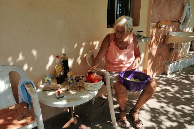 Unique gastro experience with locals in high hills above Budva! - Lunch at the Kuzman Household: Garden Food, Homemade Wine, and Real Stories